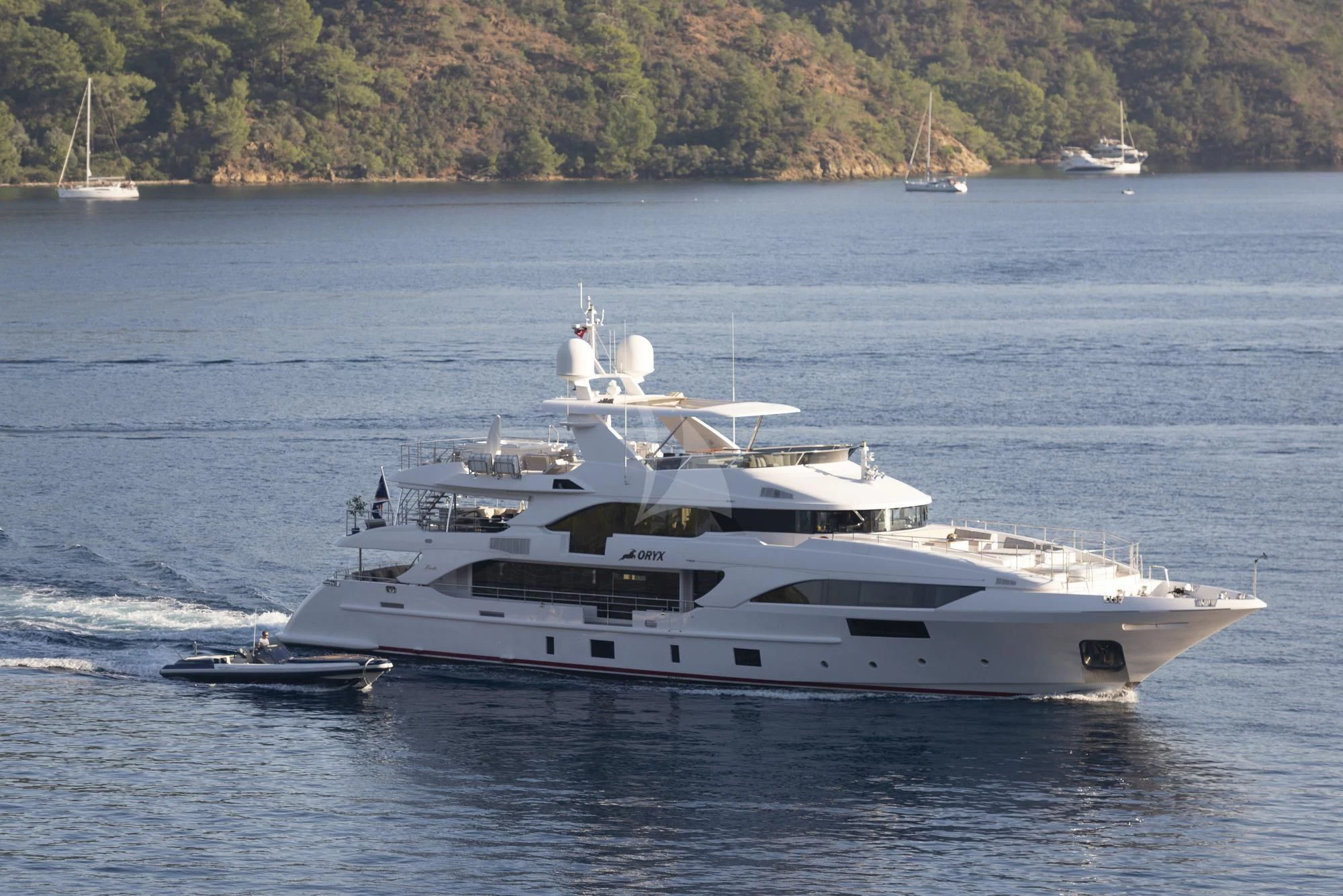 a yacht on the water aboard ORYX Yacht for Sale