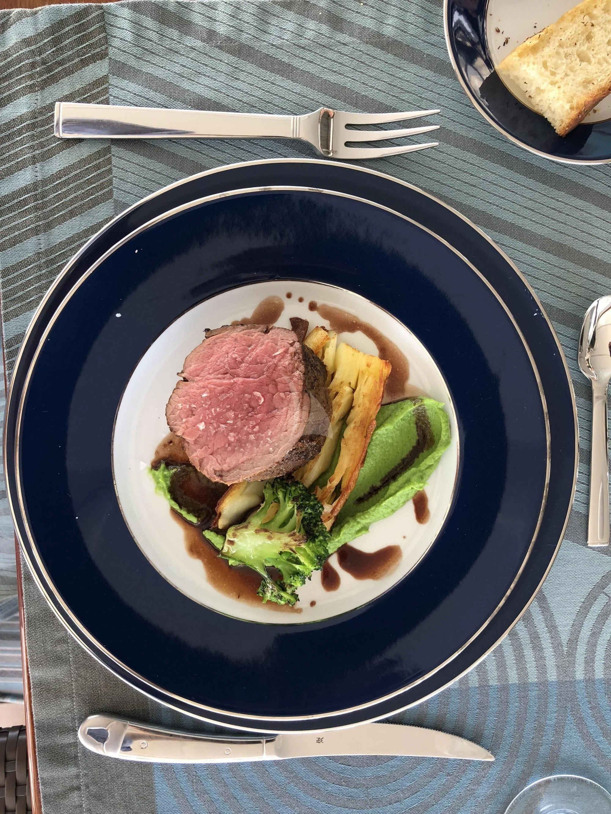 a plate of food aboard ORYX Yacht for Sale