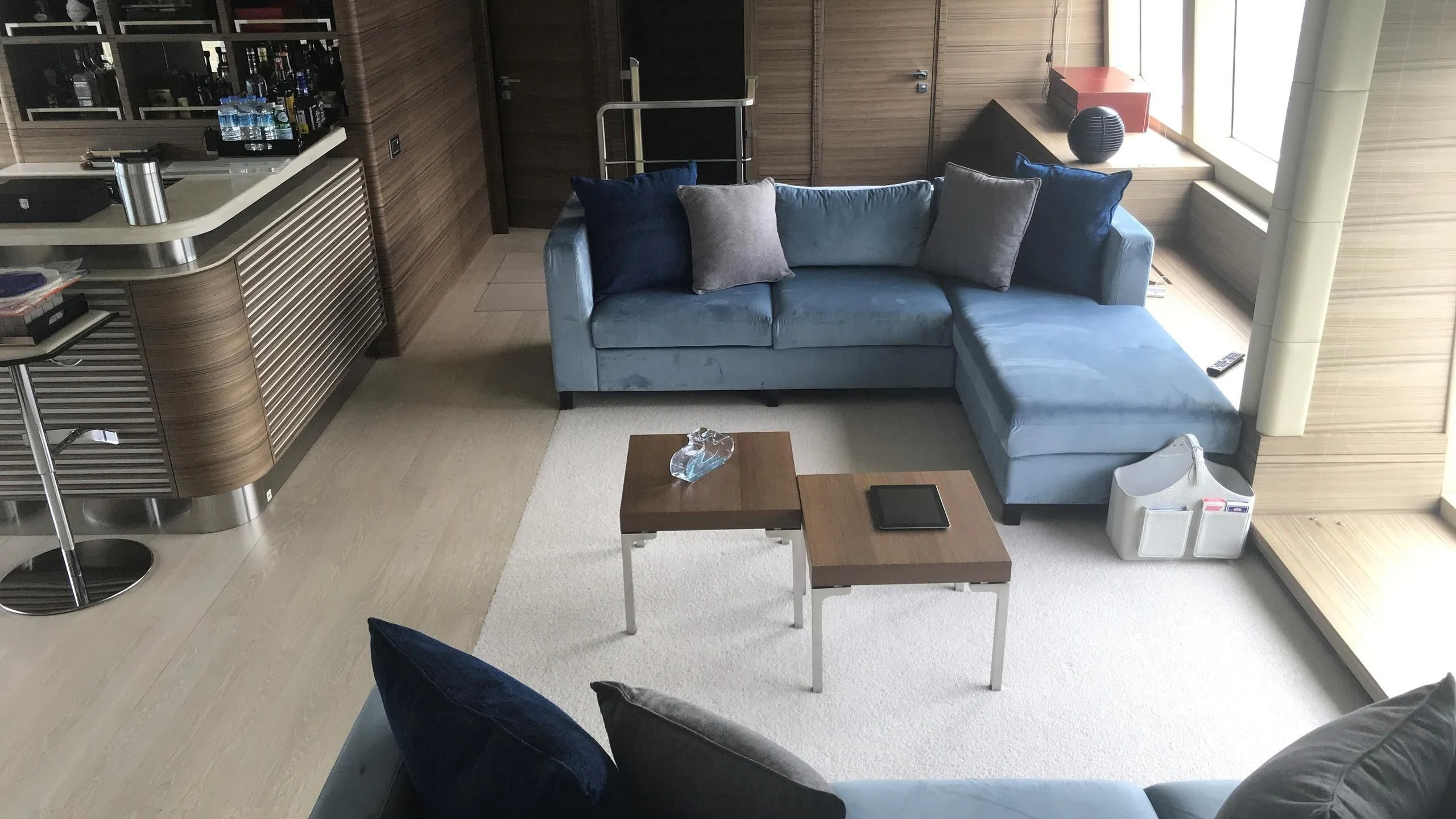 a living room with a couch and coffee table aboard ORYX Yacht for Sale