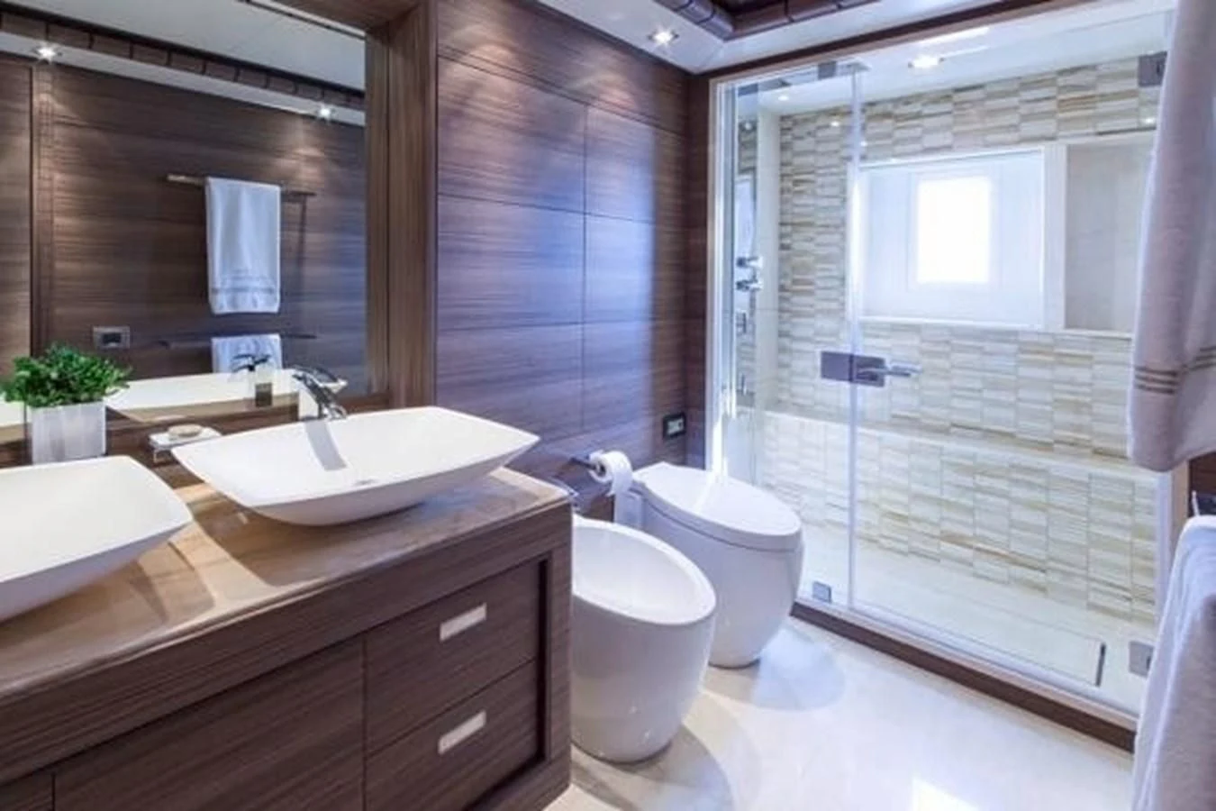 a bathroom with a sink and a toilet aboard ORYX Yacht for Sale