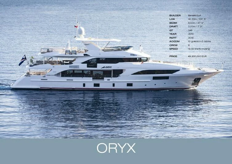 a white yacht in the water aboard ORYX Yacht for Sale