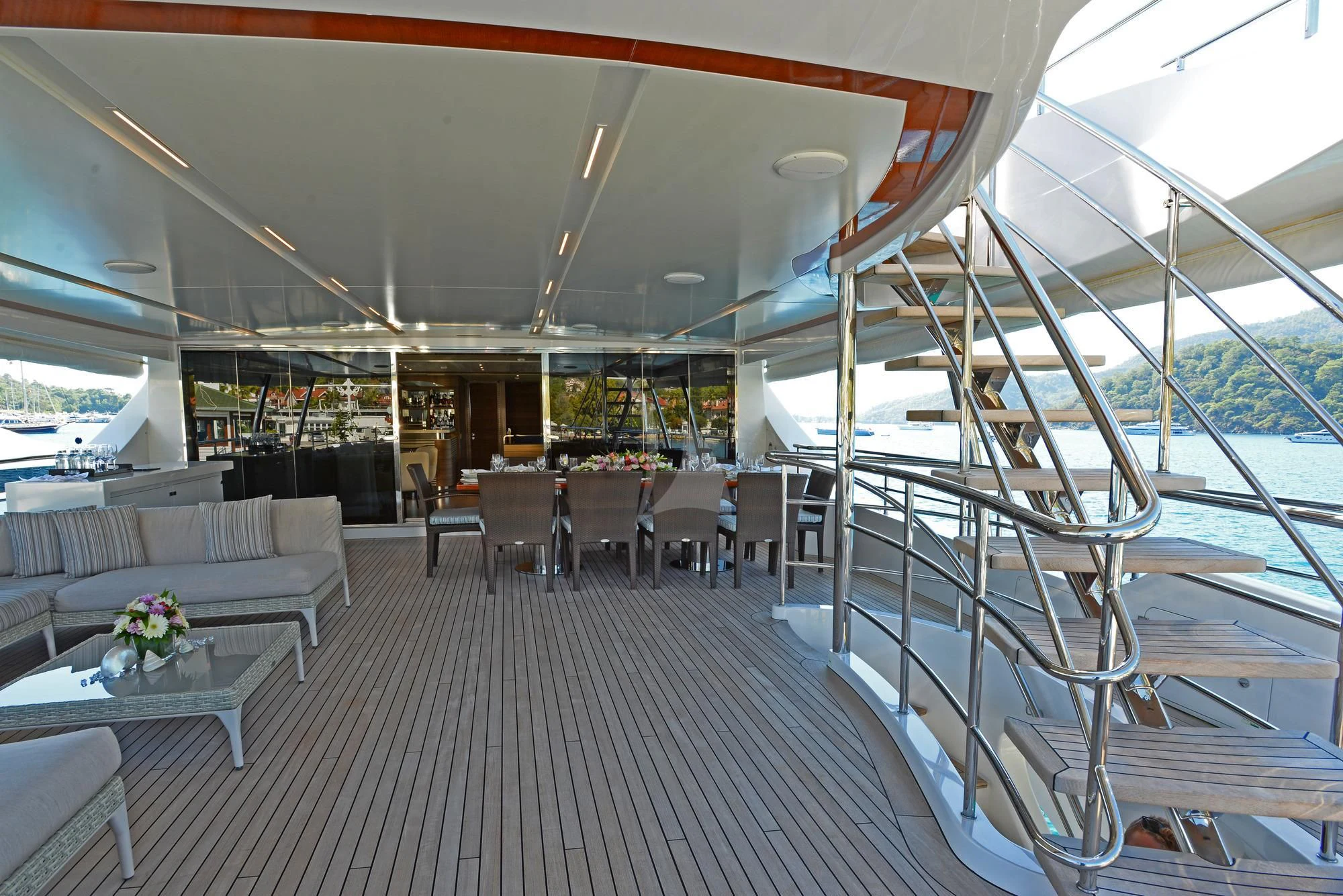 a large room with tables and chairs aboard ORYX Yacht for Sale