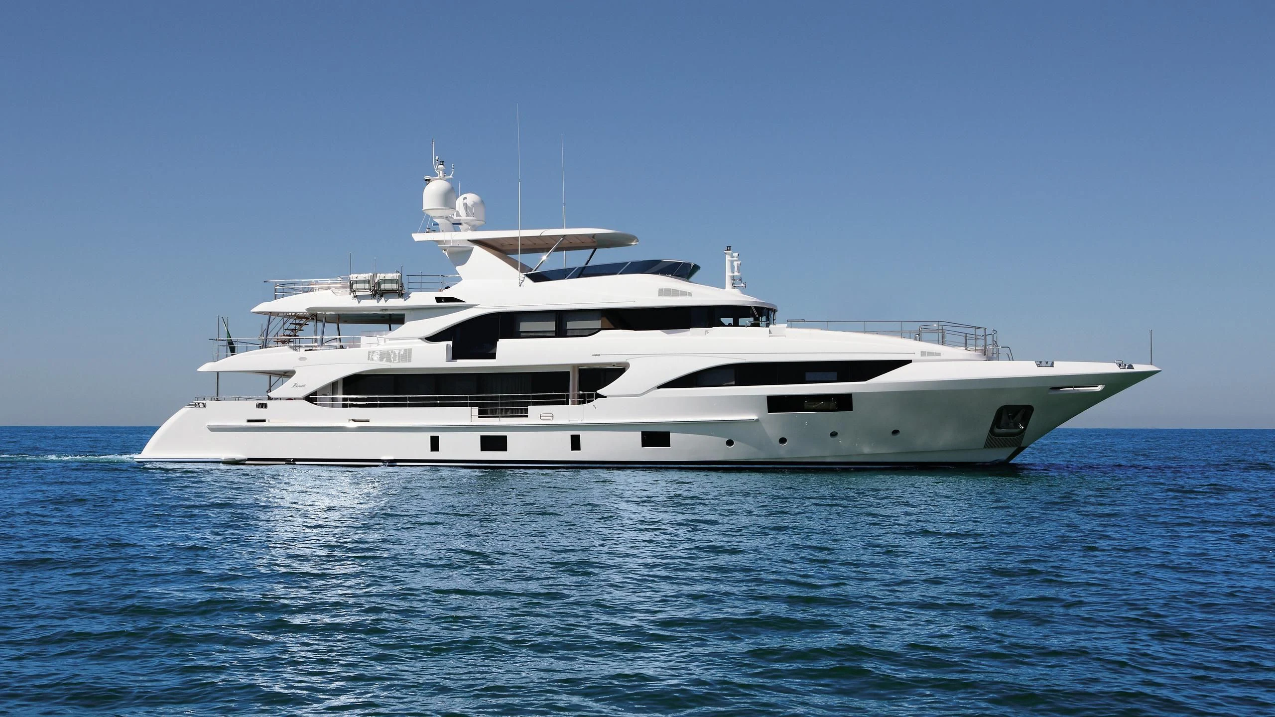 a white yacht in the water aboard ORYX Yacht for Sale