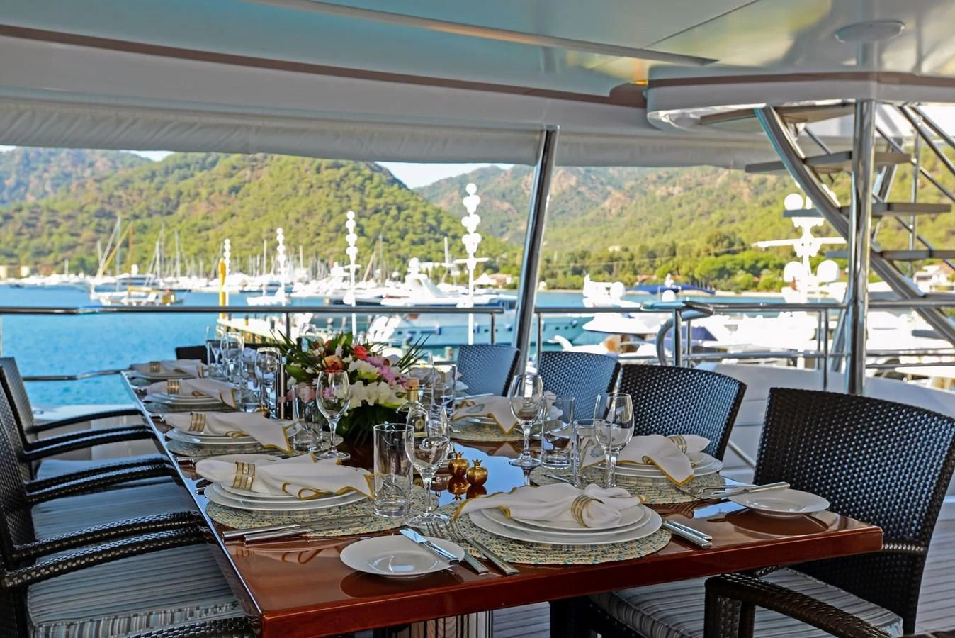 a table set for a meal aboard ORYX Yacht for Sale