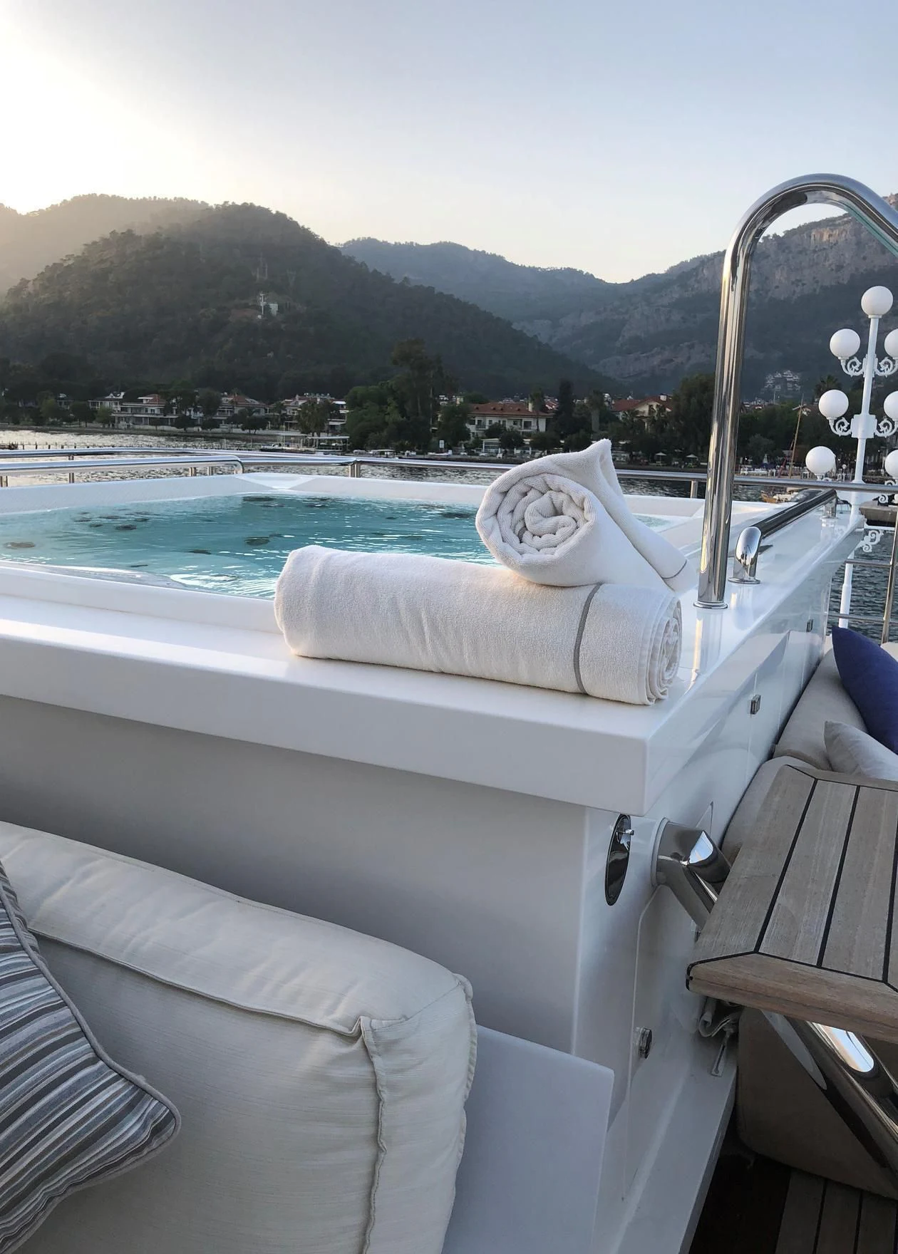 a boat with a white cover and a white towel on it aboard ORYX Yacht for Sale