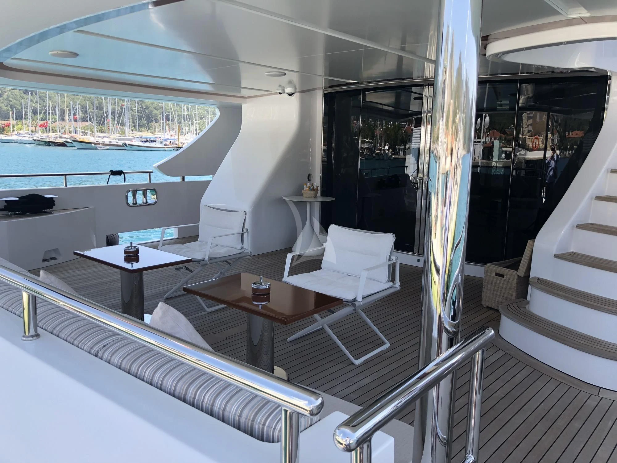 a room with a table and chairs aboard ORYX Yacht for Sale