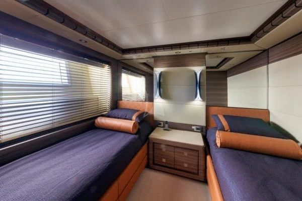 a room with two beds aboard ORYX Yacht for Sale