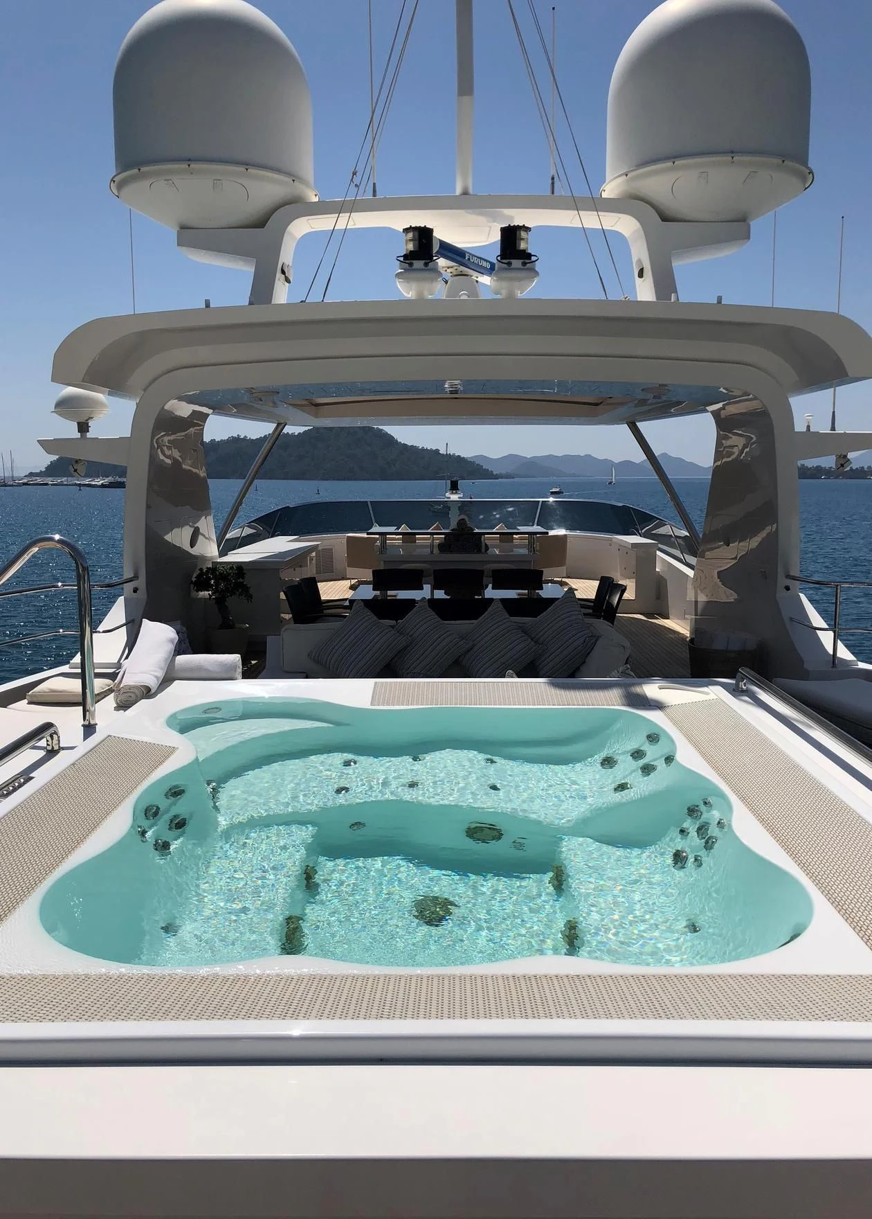 a boat with a blue water body aboard ORYX Yacht for Sale