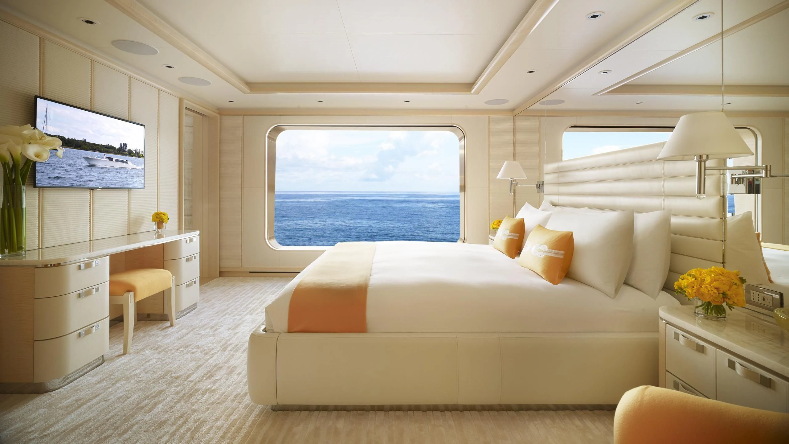 a bedroom with a large bed aboard AQUARIUS Yacht for Sale