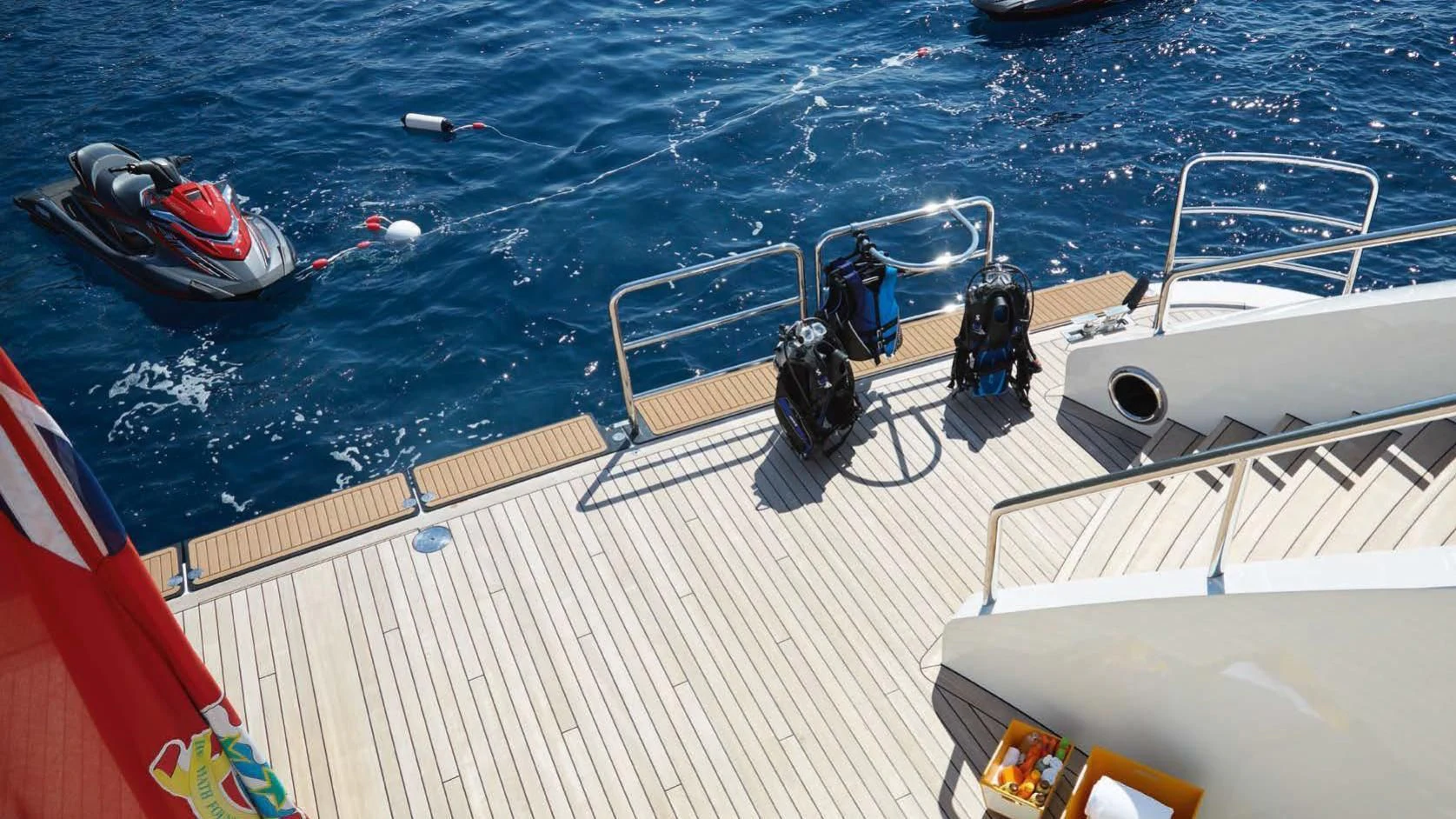 a boat with a motor attached to it aboard AQUARIUS Yacht for Sale