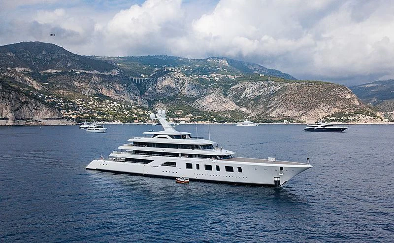 a white yacht in the water aboard AQUARIUS Yacht for Sale