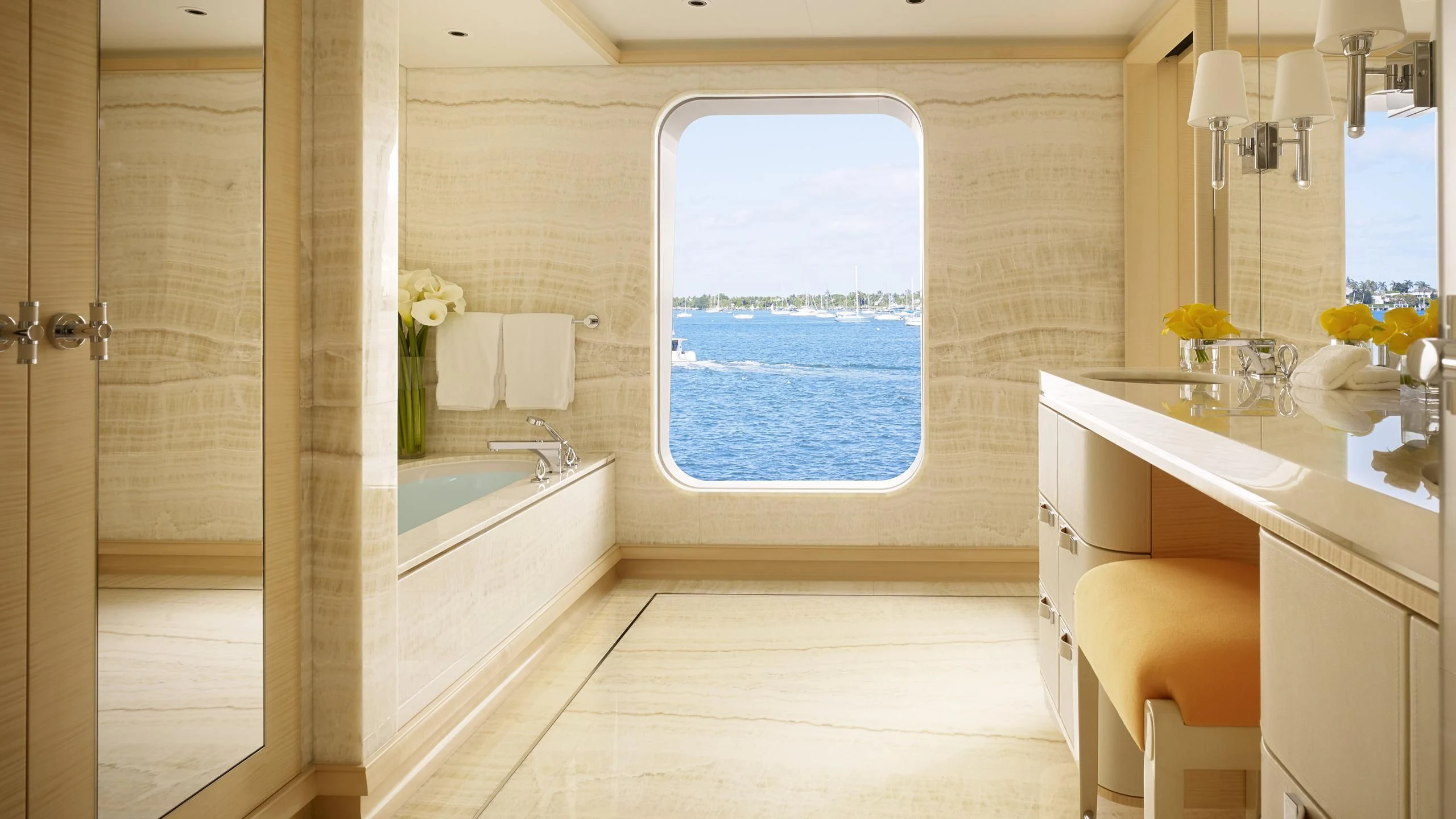 a bathroom with a bathtub and sink aboard AQUARIUS Yacht for Sale