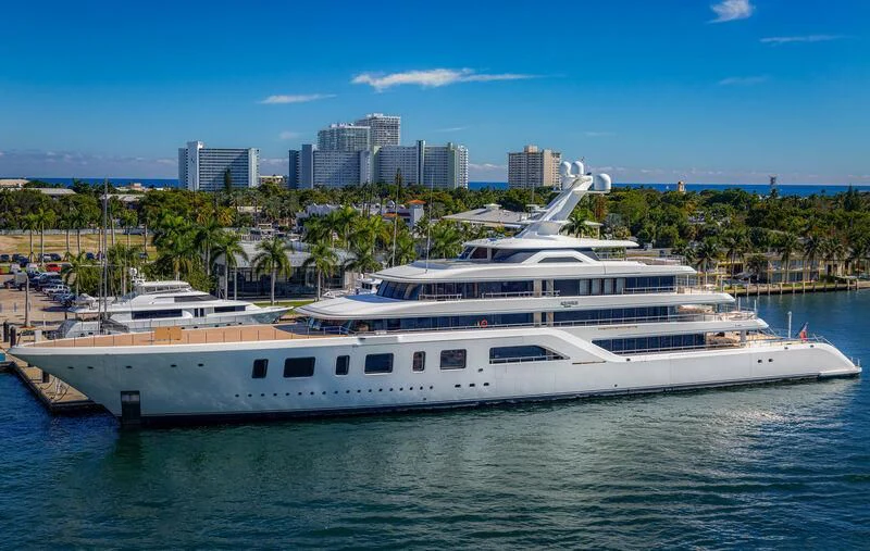 a large white yacht in the water aboard AQUARIUS Yacht for Sale