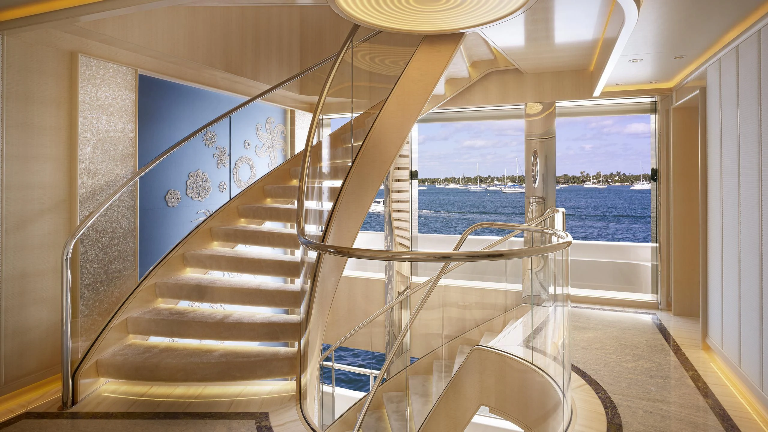 a staircase leading to a beach aboard AQUARIUS Yacht for Sale