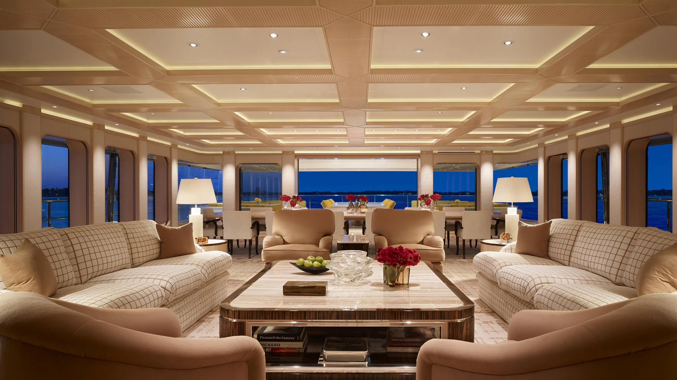 a living room with a large screen aboard AQUARIUS Yacht for Sale