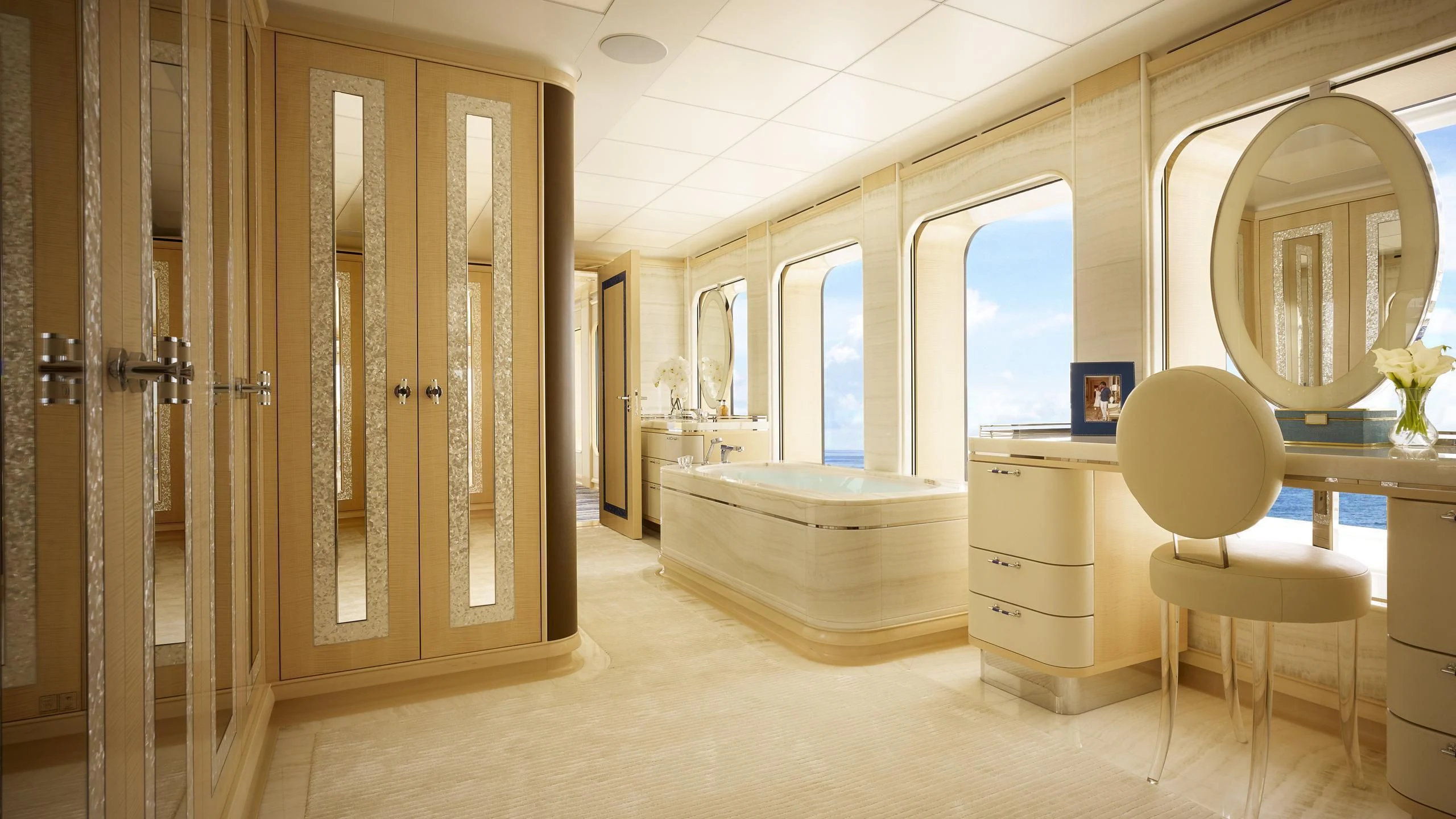 a room with a mirror and a chair aboard AQUARIUS Yacht for Sale