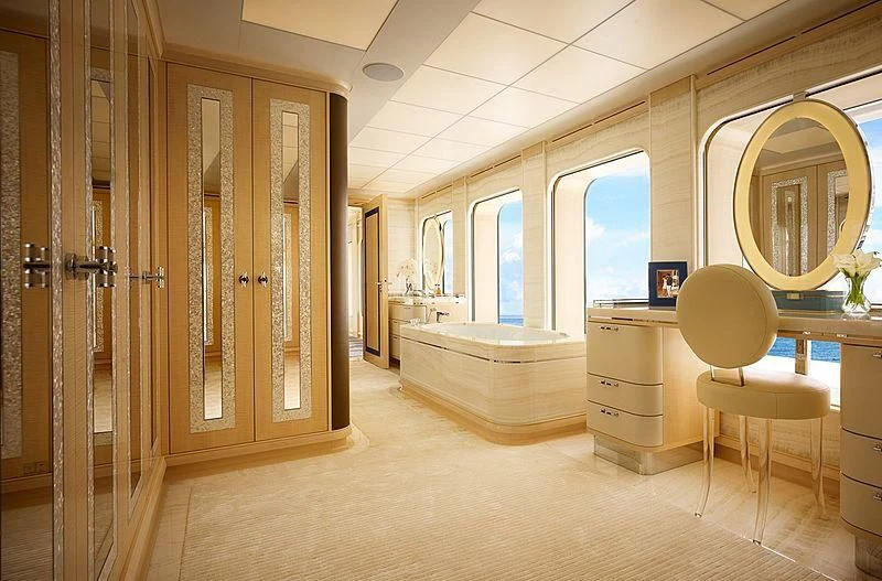 a room with a mirror and a chair aboard AQUARIUS Yacht for Sale