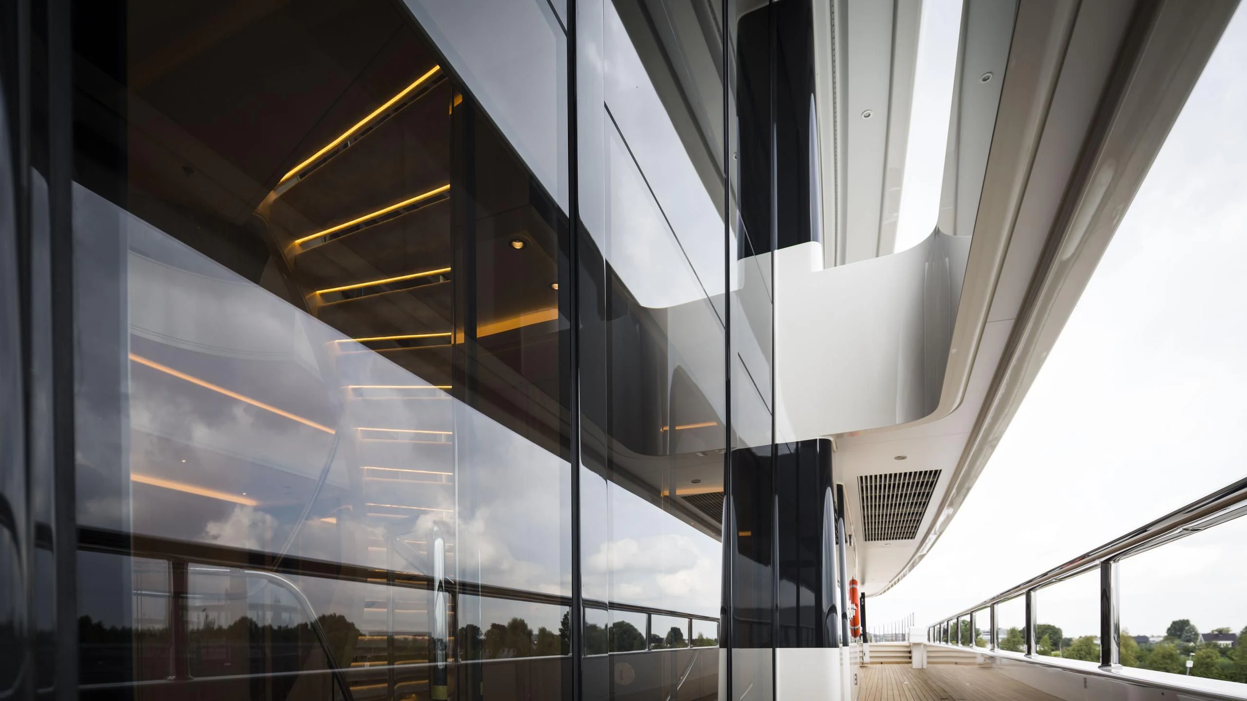 a building with glass windows aboard AQUARIUS Yacht for Sale