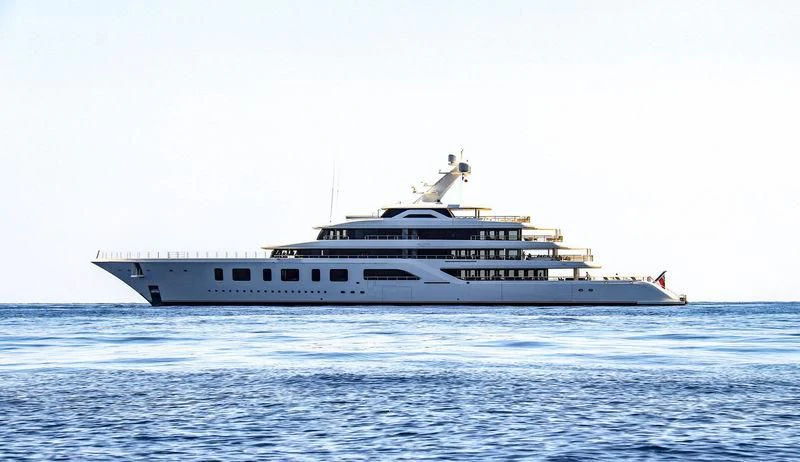 a large white boat in the water aboard AQUARIUS Yacht for Sale