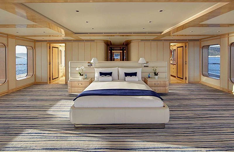 a large bedroom with a large bed aboard AQUARIUS Yacht for Sale