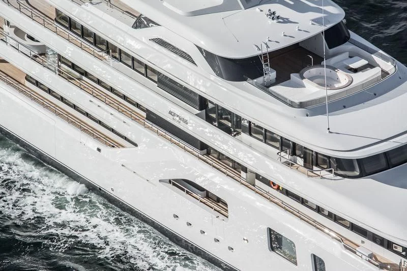 a large ship in the water aboard AQUARIUS Yacht for Sale