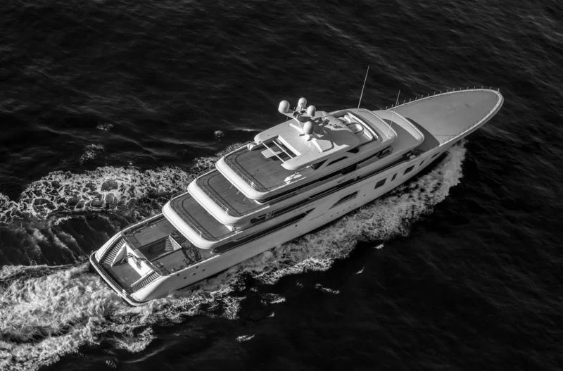 a car on the water aboard AQUARIUS Yacht for Sale