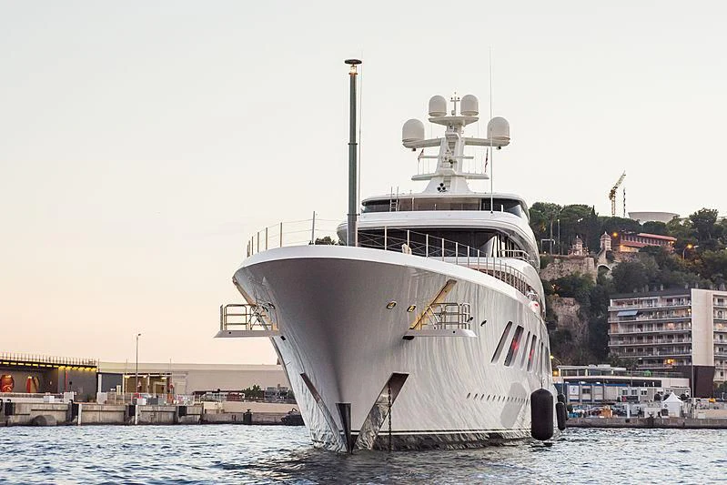 a large white boat in the water aboard AQUARIUS Yacht for Sale