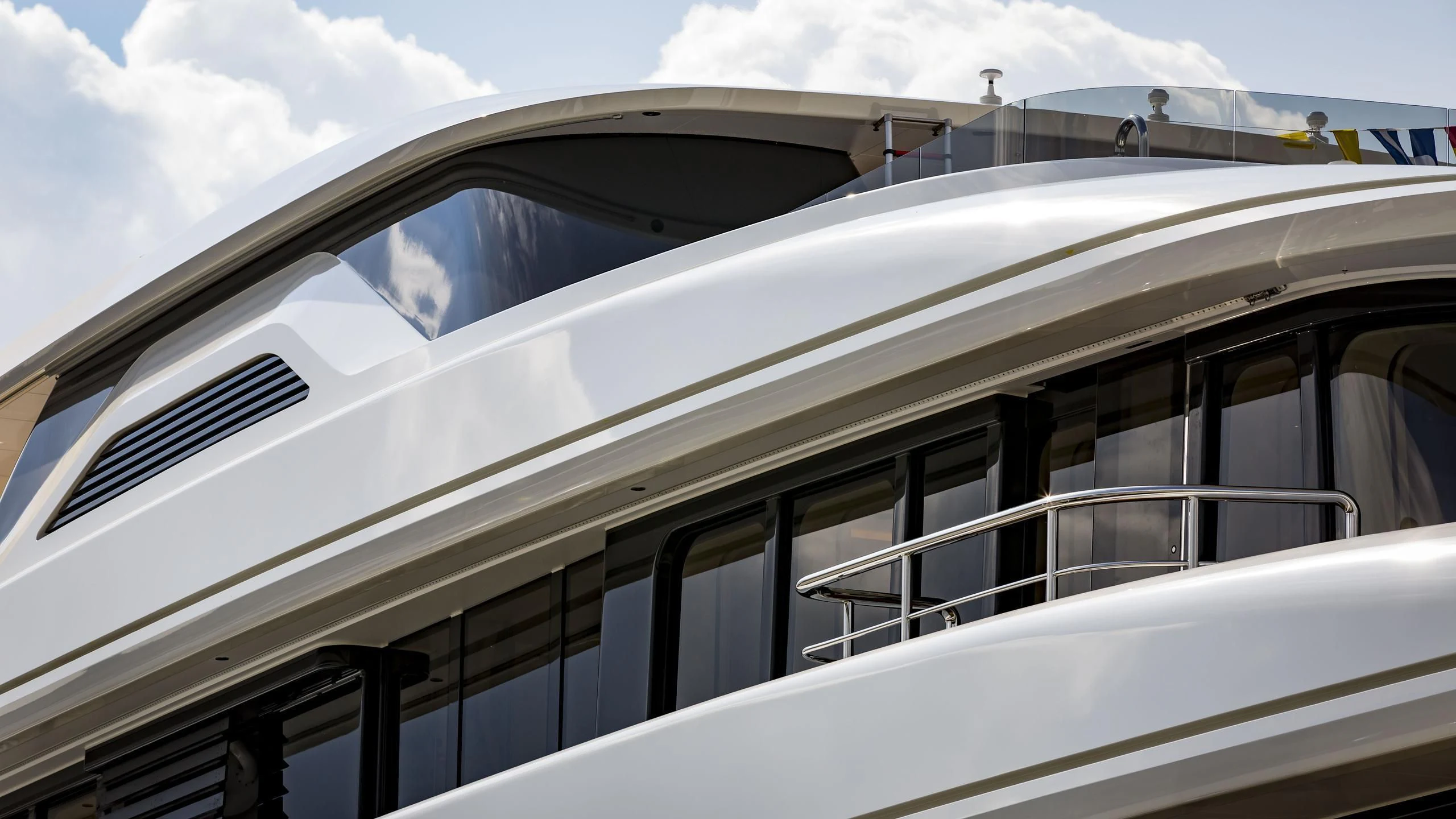 a building with glass windows aboard AQUARIUS Yacht for Sale