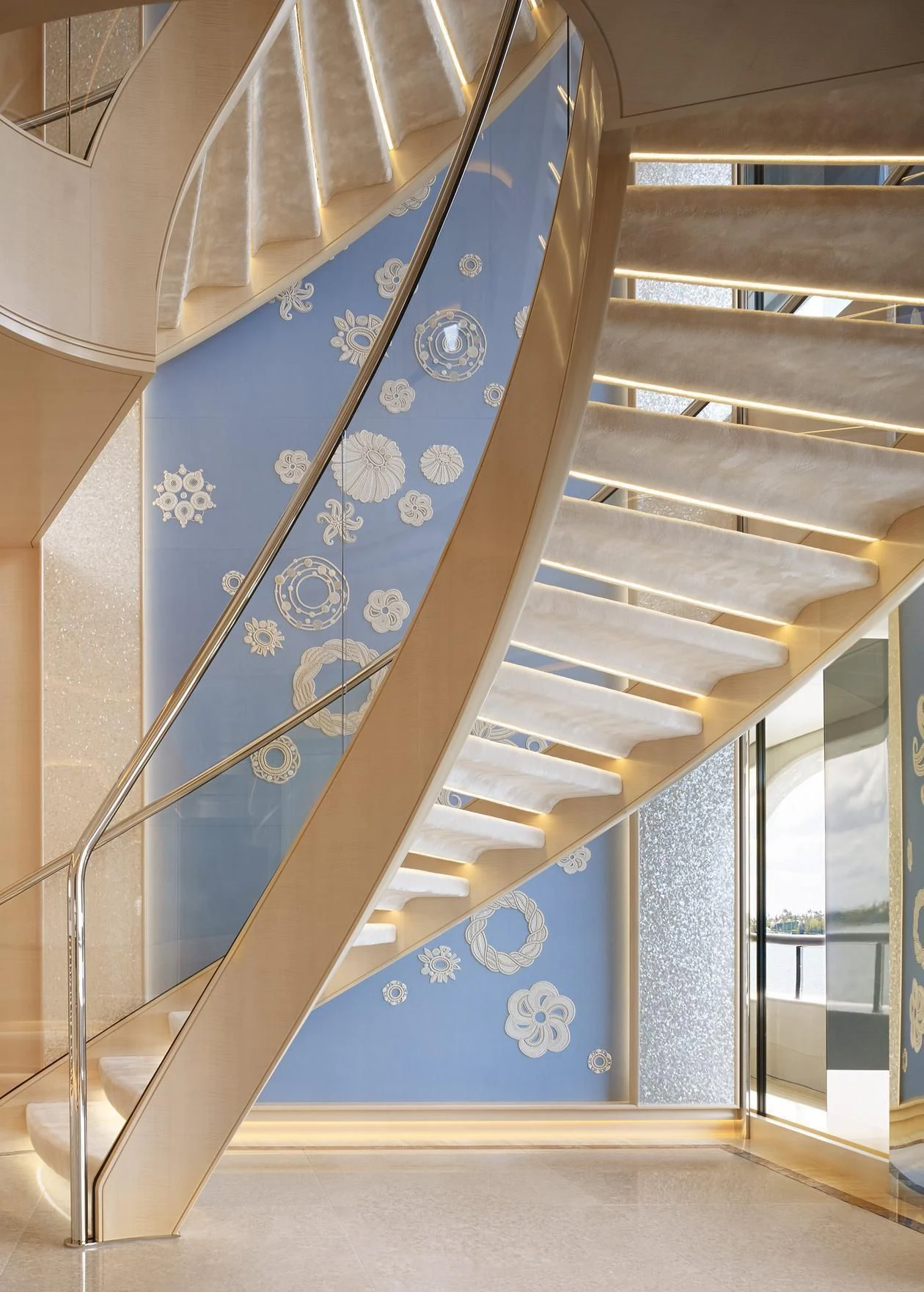a staircase with a blue wall aboard AQUARIUS Yacht for Sale