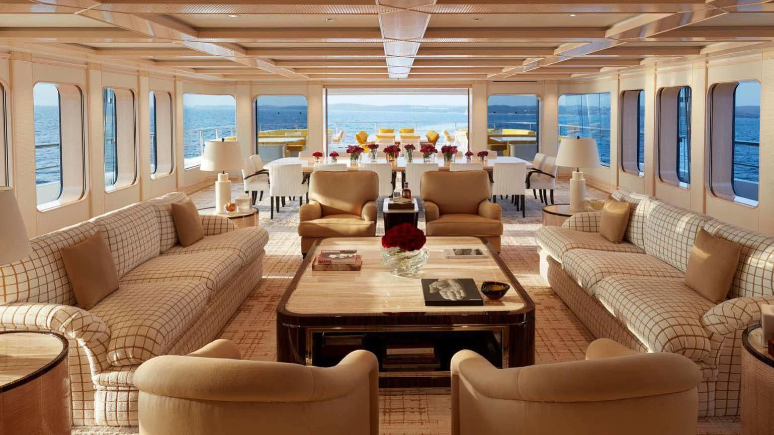 a living room with a large window aboard AQUARIUS Yacht for Sale