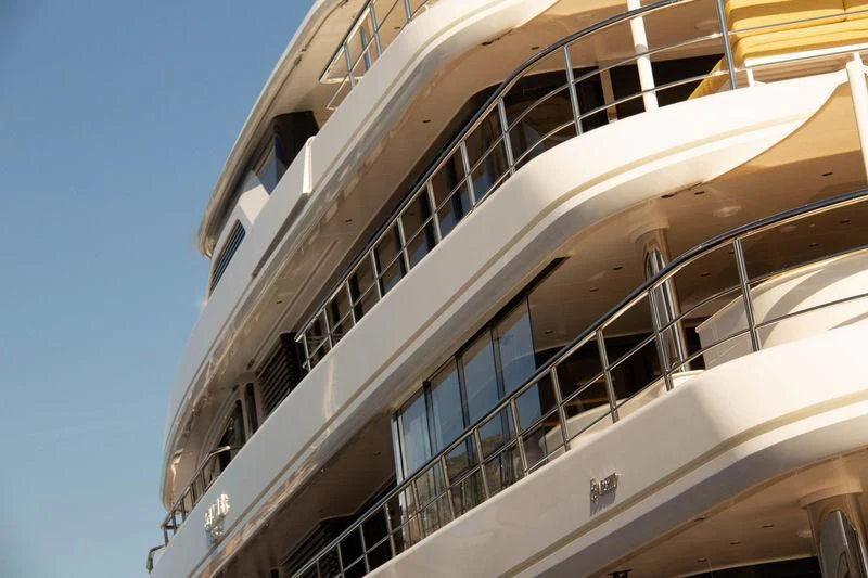 a building with balconies aboard AQUARIUS Yacht for Sale
