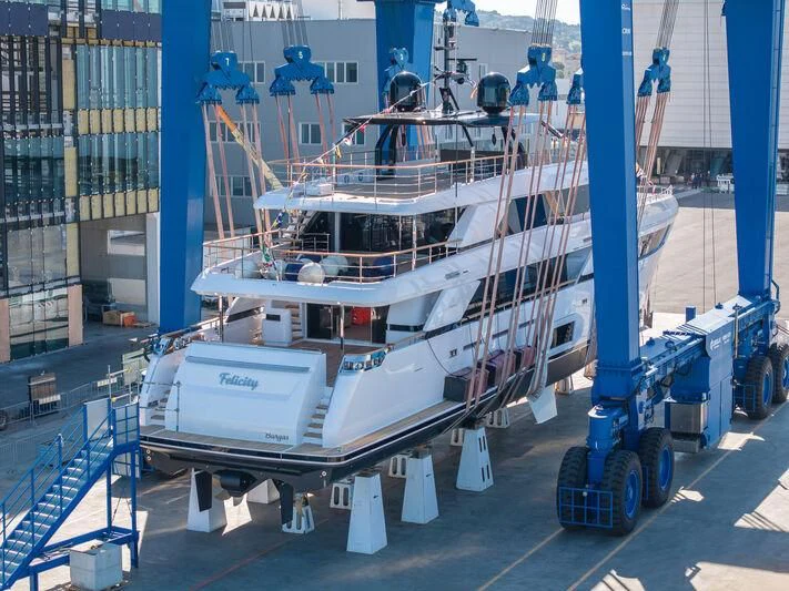 a large white machine in a factory aboard NIMIR Yacht for Sale