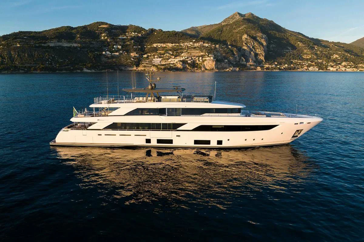 a white yacht in the water aboard NIMIR Yacht for Sale