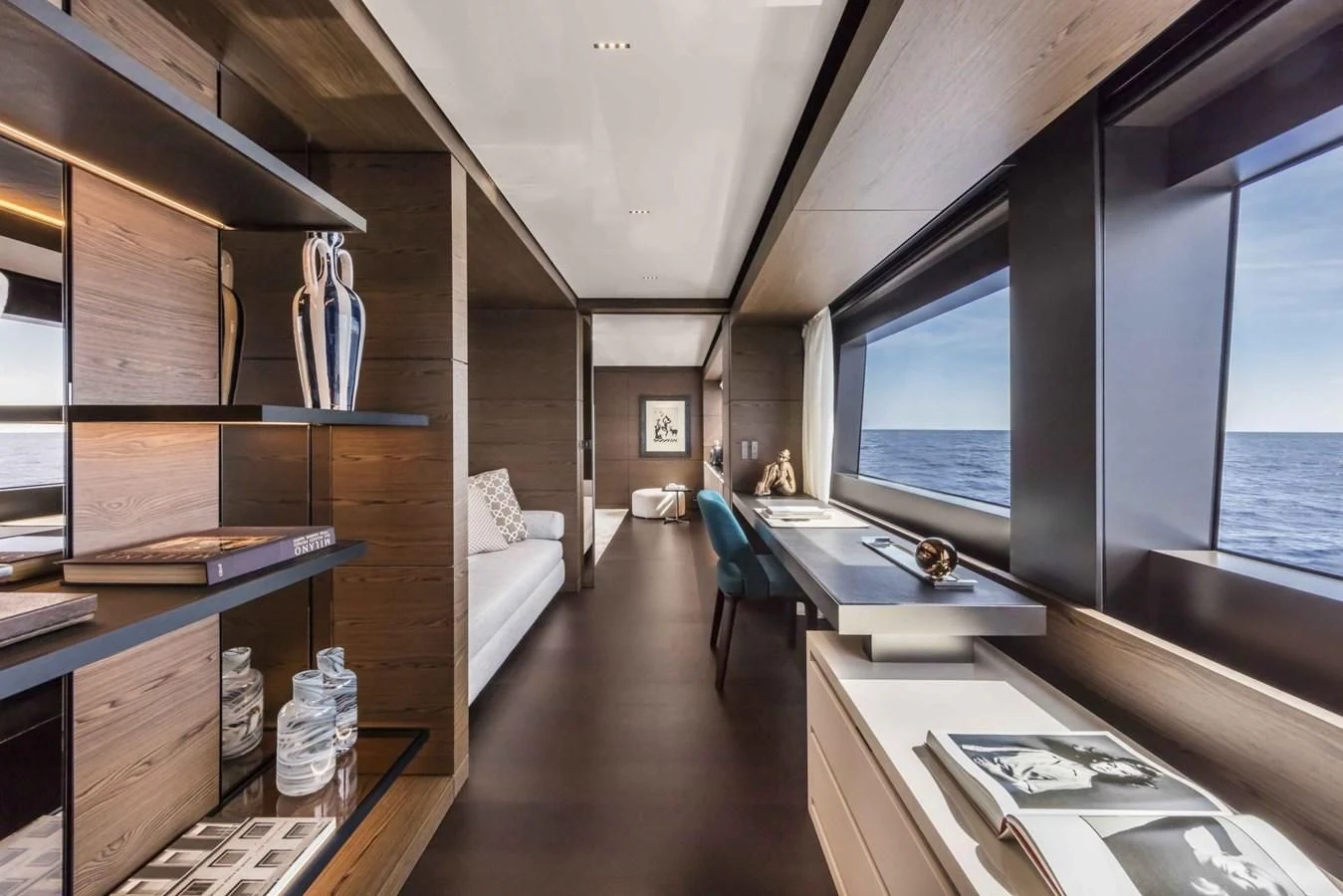 a room with a bed and a desk aboard NIMIR Yacht for Sale