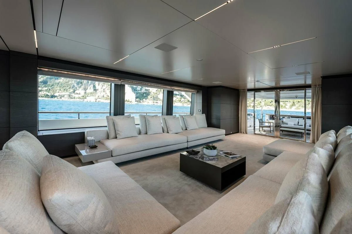 a living room with a large window aboard NIMIR Yacht for Sale