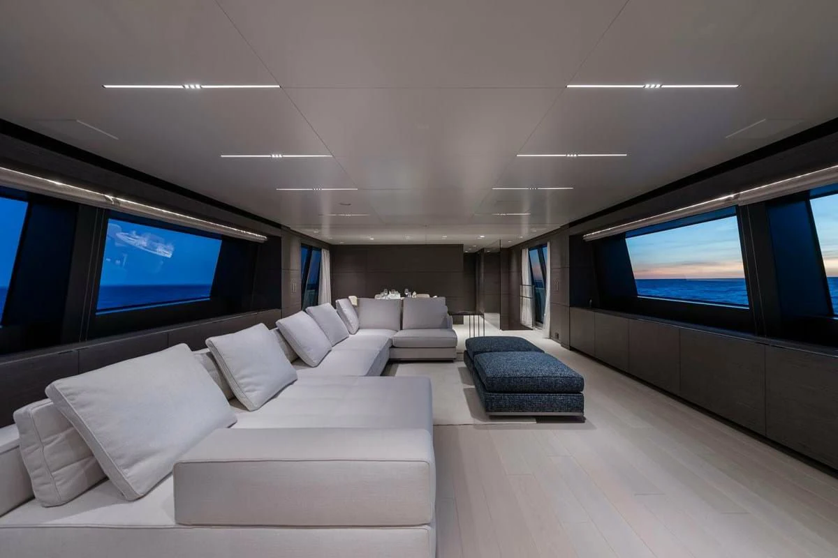 a room with a couch and a tv aboard NIMIR Yacht for Sale