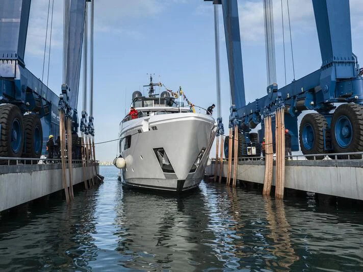 a boat docked at a port aboard NIMIR Yacht for Sale