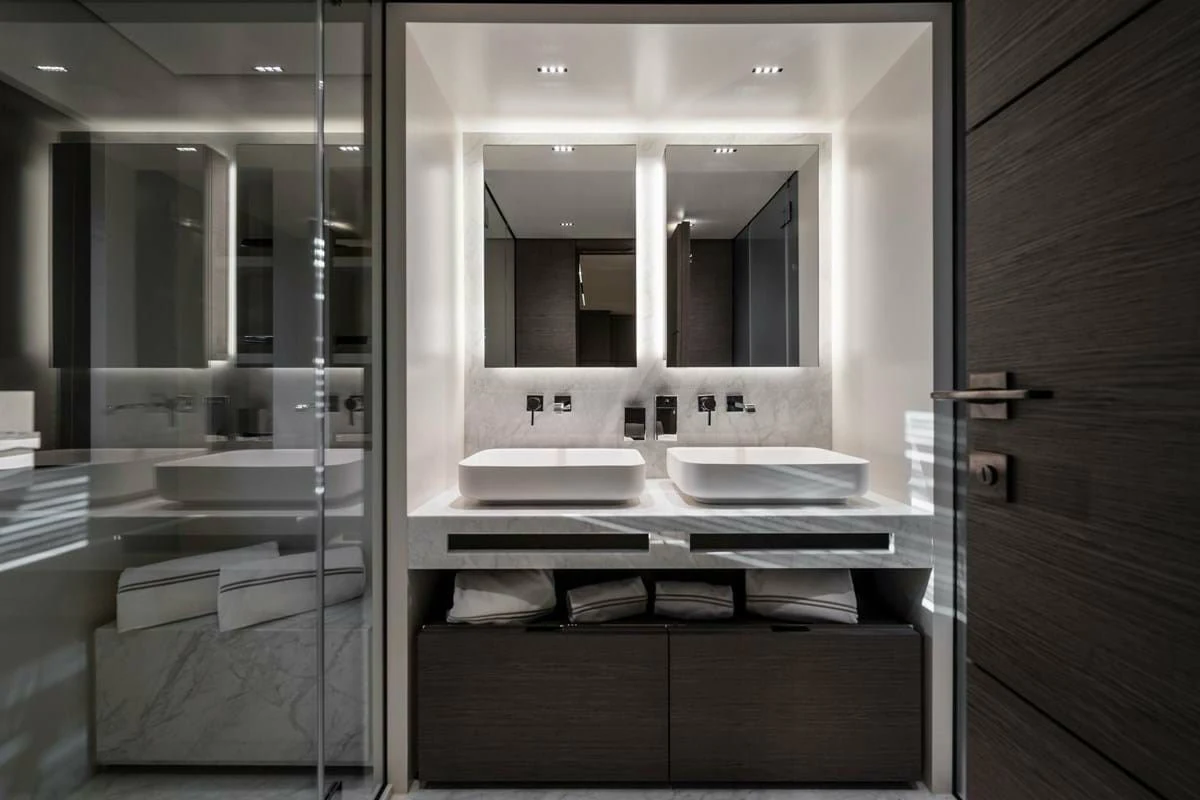 a bathroom with a sink and a mirror aboard NIMIR Yacht for Sale