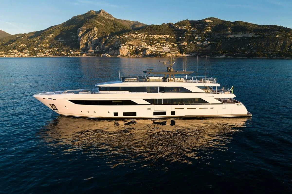 a white yacht in the water aboard NIMIR Yacht for Sale
