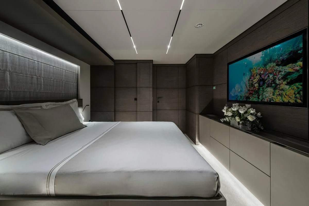 a bed in a room aboard NIMIR Yacht for Sale