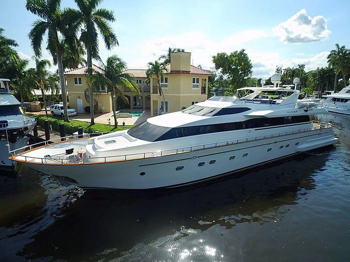 a boat parked on the side of a river aboard THE ROCK Yacht for Sale