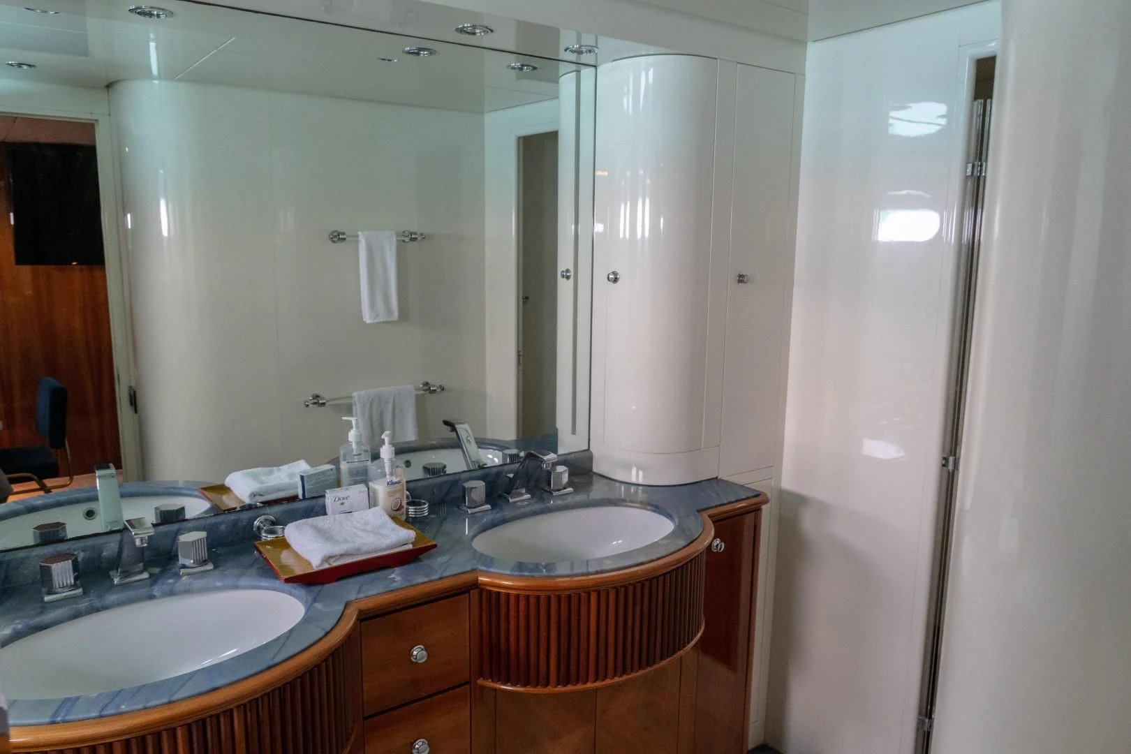 a bathroom with a sink and a mirror aboard EL CAPRICHO Yacht for Sale
