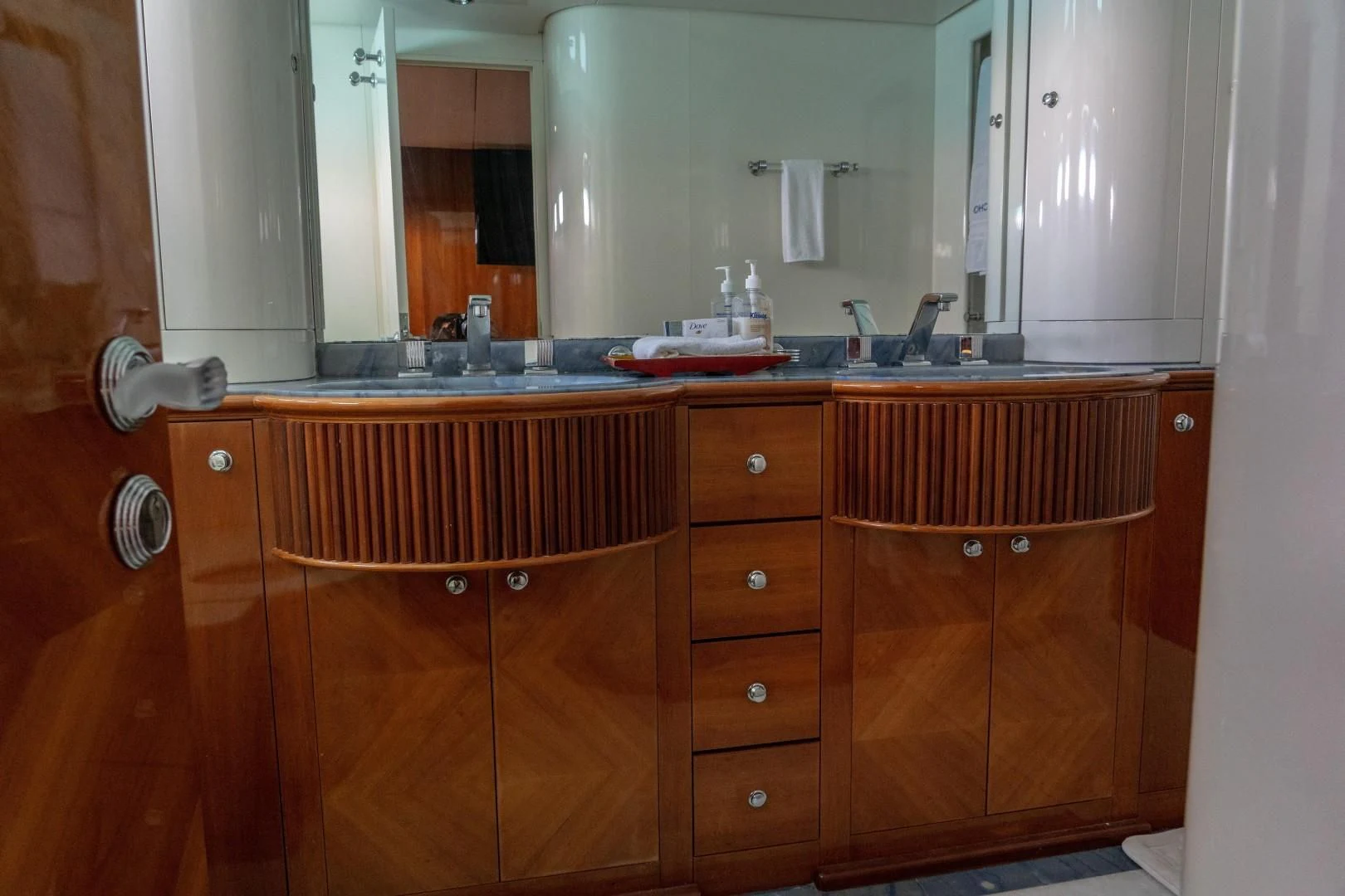a bathroom with a sink and cabinets aboard EL CAPRICHO Yacht for Sale