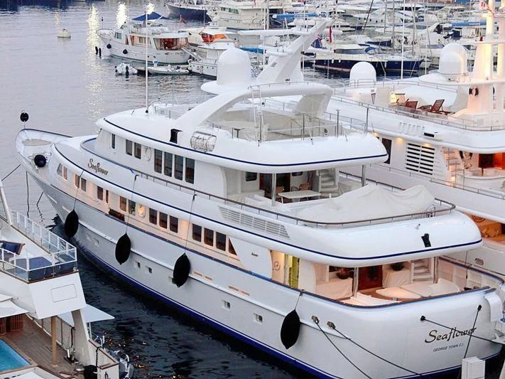 a group of boats in a harbor aboard CIPITOUBA Yacht for Sale