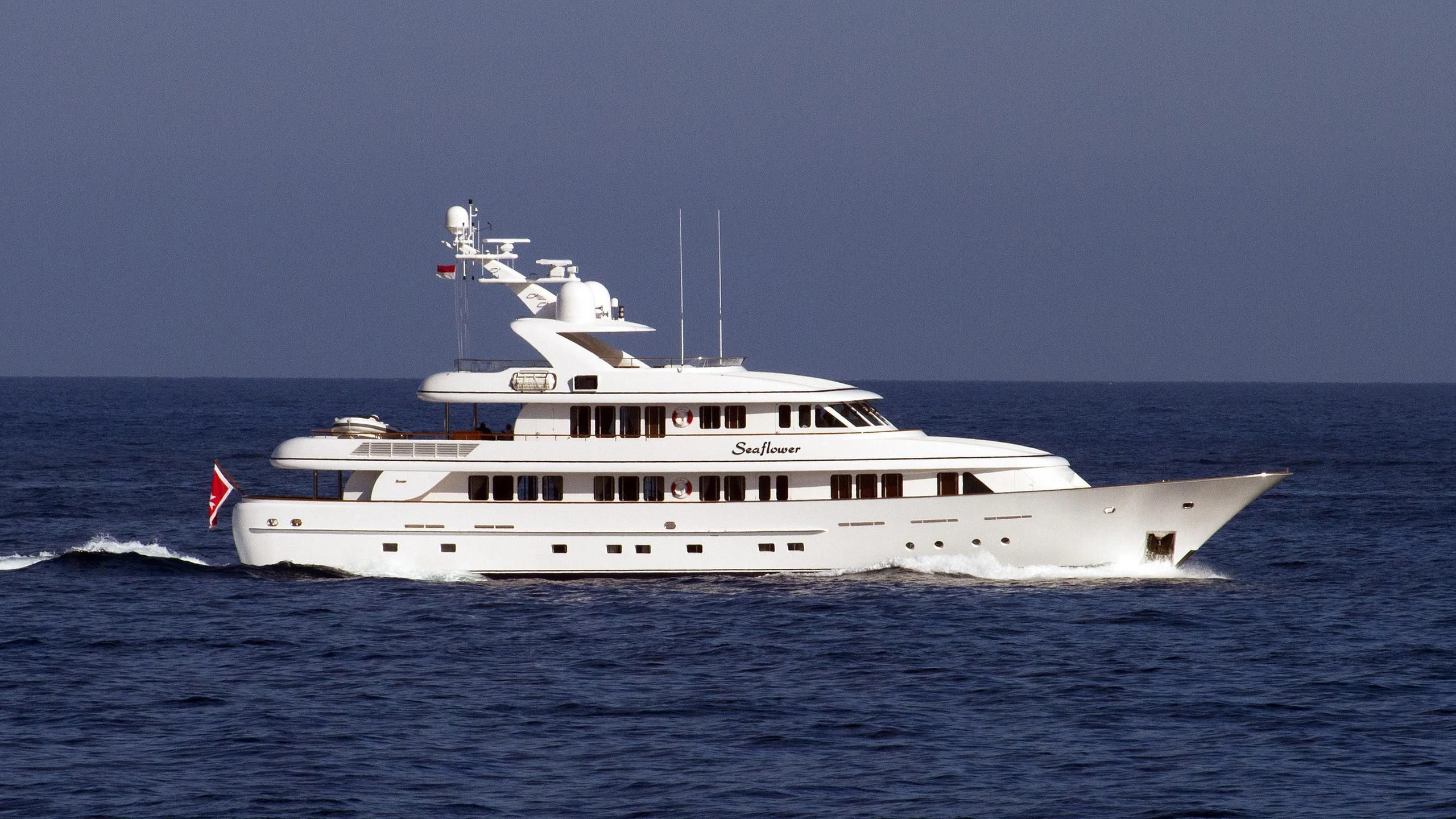 a large white boat in the water aboard CIPITOUBA Yacht for Sale