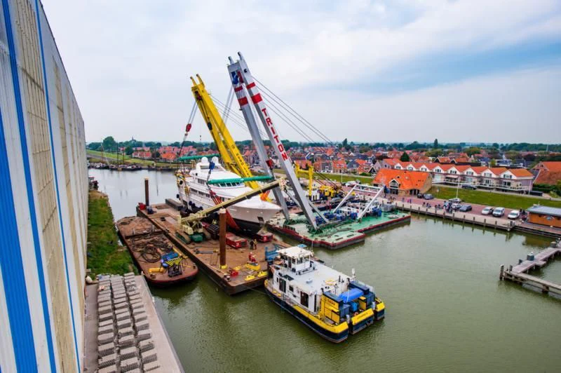 a crane over a body of water aboard CIPITOUBA Yacht for Sale