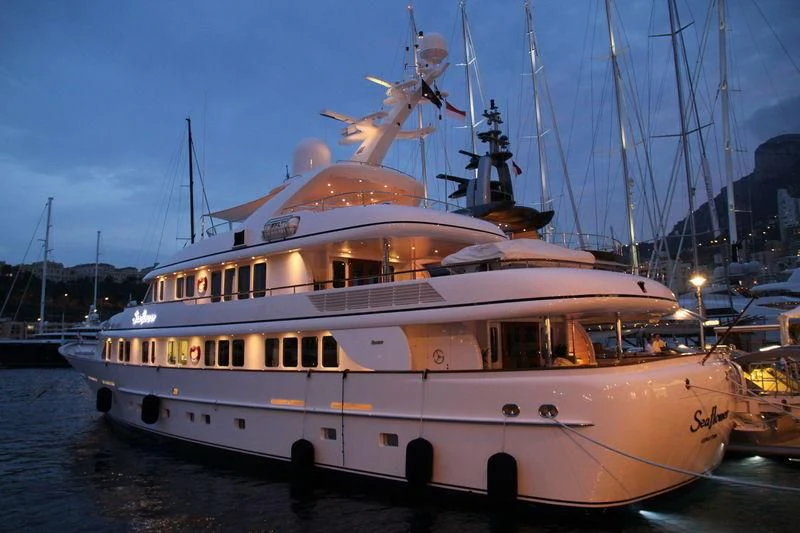 a large white boat with lights on it aboard CIPITOUBA Yacht for Sale
