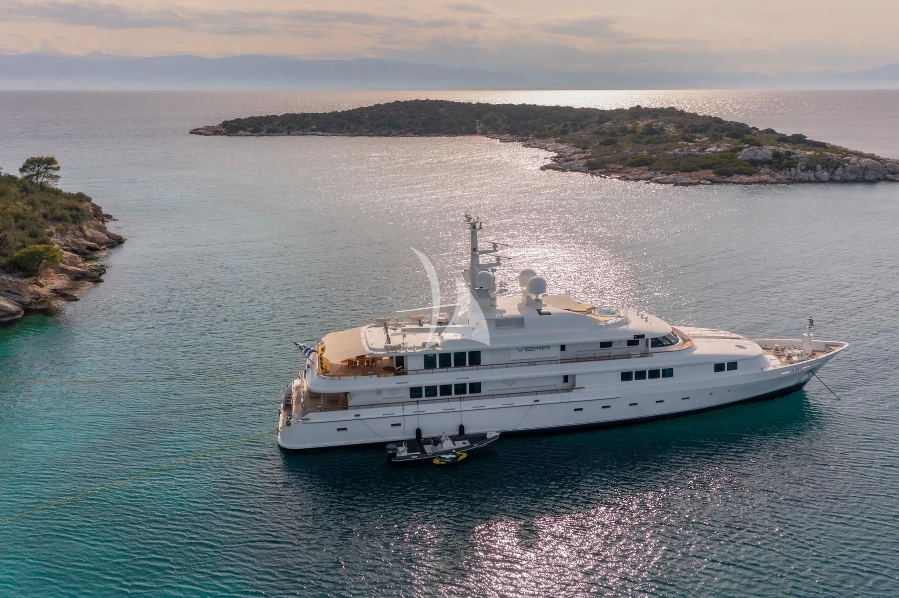 a white boat in the water aboard VERA Yacht for Sale