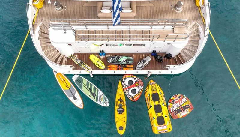 a boat with a flag on it aboard VERA Yacht for Sale