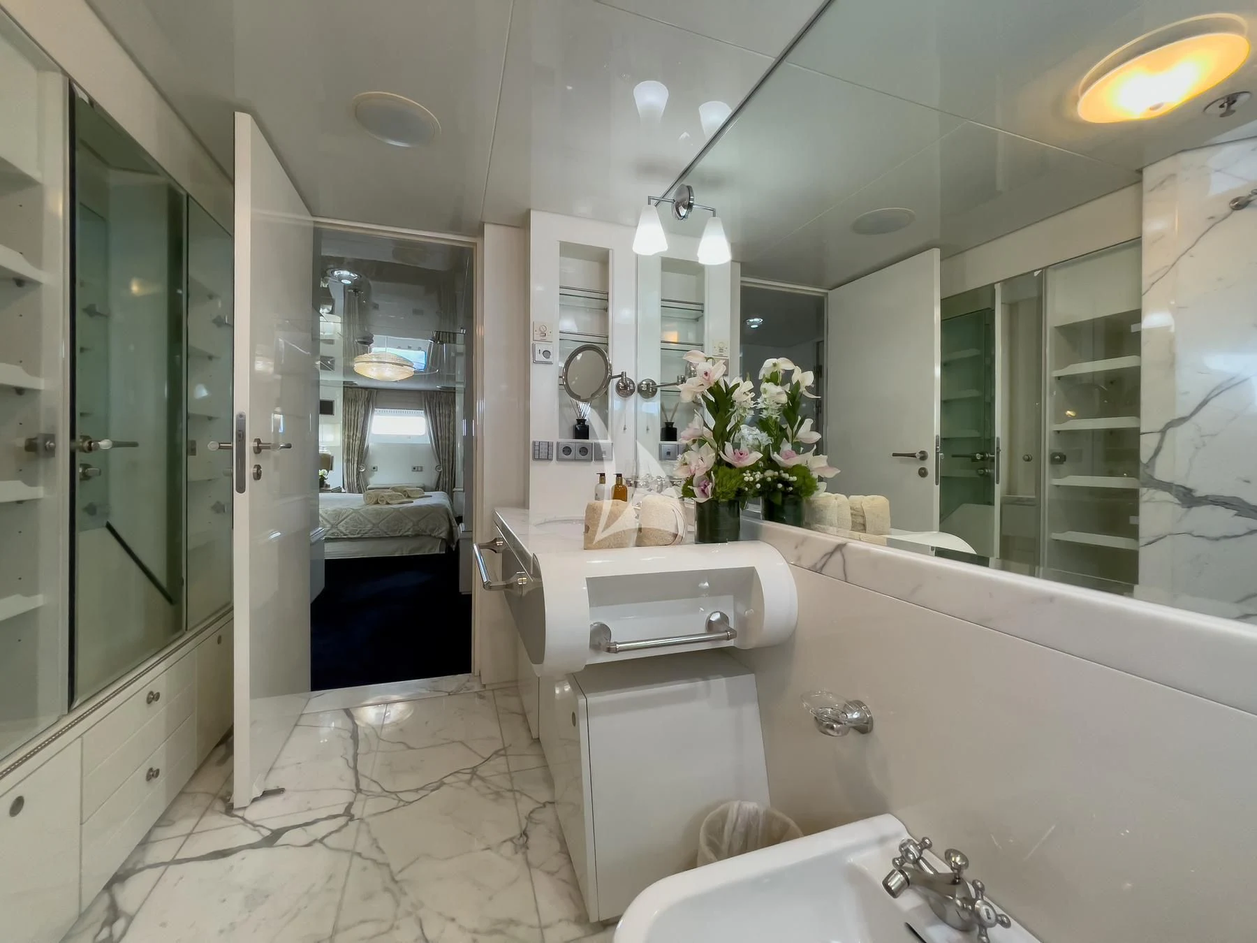 a bathroom with a large mirror aboard VERA Yacht for Sale